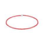Pink beaded choker necklace on a white background. Available at Be Charmed
