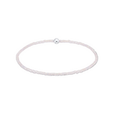 Silver bracelet with a single bead on a white background. Available at Be Charmed