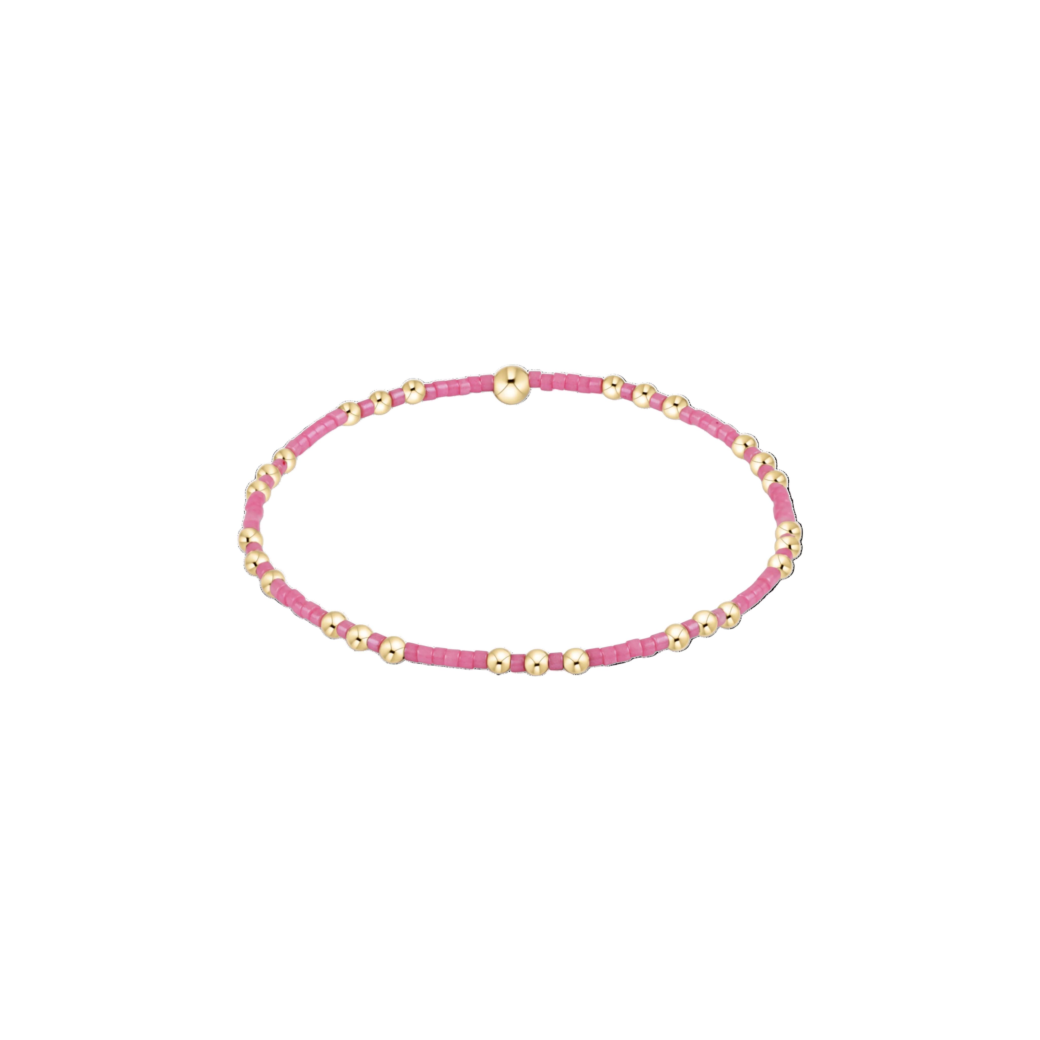 Pink beaded bracelet with gold beads on a white background. Available at Be Charmed