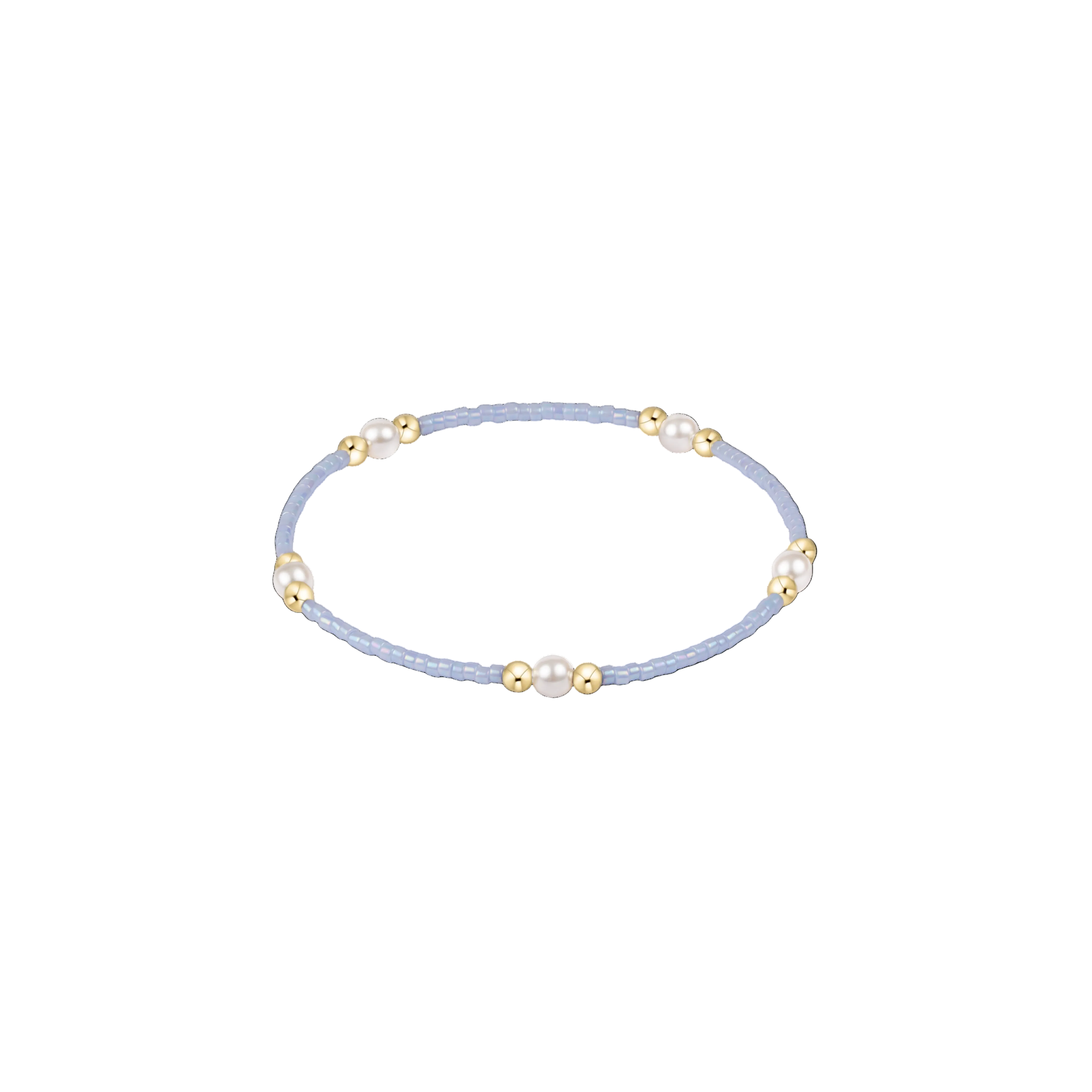 Delicate bracelet with small beads on a light blue cord against a white background. Available at Be Charmed