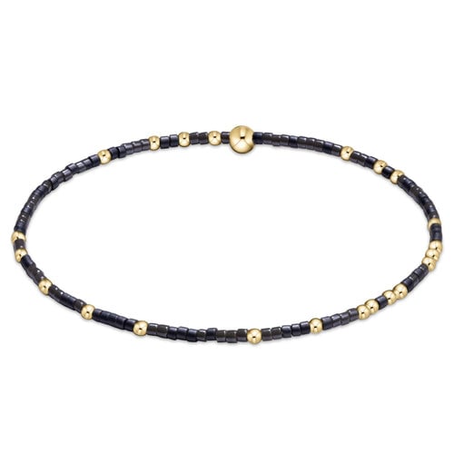 enewton Hope Unwritten bracelet in soft grey “Groutfit” beads arranged in symbolic pattern; minimalist, elegant, stackable. Available at Be Charmed.