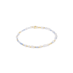Beaded bracelet with gold accents on a white background. Available at Be Charmed