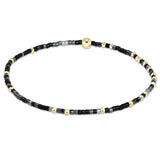 enewton Hope Unwritten bracelet in “Nothin’ Good After Midnight” dark tones; bold, moody, and stretch-fit. Available at Be Charmed.