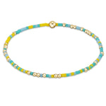 enewton Hope Unwritten Bracelet – Say Aloe To My Friend with green seed beads and 14k gold-filled accents. Stackable and water-friendly. Available at Be Charmed.