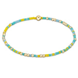enewton Hope Unwritten Bracelet – Say Aloe To My Friend with green seed beads and 14k gold-filled accents. Stackable and water-friendly. Available at Be Charmed.