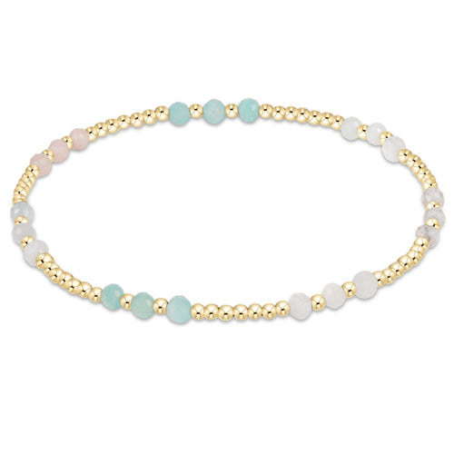 enewton Joy Pattern 3mm bracelet in “Hot Mess” multicolor gemstones with gold-filled beads; bold, playful, and stackable. Available at Be Charmed.