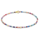 enewton Hope Unwritten Bracelet in Hot Mess with colorful seed beads and 14k gold-filled accents. Stretchy, water-friendly, and fun. Available at Be Charmed.