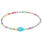 enewton Hope Unwritten Signature Cross Bracelet in Hot Mess with 14k gold-filled beads and cross charm. Meaningful, stackable, and water-friendly. Available at Be Charmed.