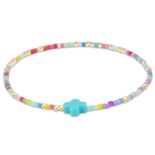 enewton Hope Unwritten Signature Cross Bracelet in Hot Mess with 14k gold-filled beads and cross charm. Meaningful, stackable, and water-friendly. Available at Be Charmed.