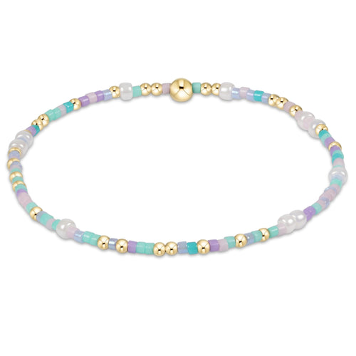 enewton Hope Unwritten Bracelet – How Do You Lilac Me Now? with lilac beads and 14k gold-filled accents. Stretchy, water-friendly, and stackable. Available at Be Charmed.