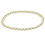 enewton Hope Grateful Bracelet – mint 2mm seed beads paired with 2mm 14kt gold-filled beads on stretch elastic. Worry-free wear: sleep, shower, sweat. Stackable and stylish. Available at Be Charmed
