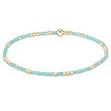 enewton Hope Unwritten Bracelet in mint—featuring mixed 2mm mint seed beads and 2mm 14 kt gold‑filled beads on high‑performance elastic for worry‑free wear (sleep, shower, sweat). Stacks beautifully. Available at Be Charmed