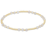 enewton Joy Pattern bracelet with 3mm moonstone beads and gold-filled accents; radiant, elegant, and stackable. Available at Be Charmed.
