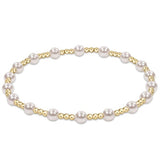 Pearl Classic Sincerity Pattern 4mm Bead Bracelet by enewton with alternating gold-filled and pearl beads on stretch cord—elegant and stackable; available at Be Charmed