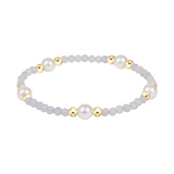 enewton Purpose Pearl 6mm Gem Bracelet with freshwater pearls and aquamarine gemstone accent, stackable stretch bracelet for everyday wear Available at Be Charmed