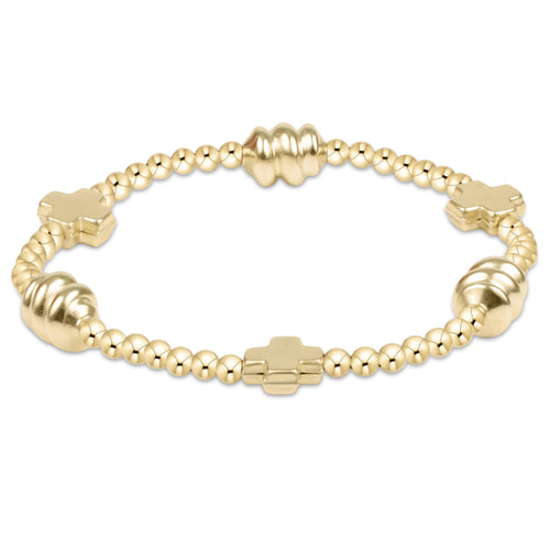 enewton Signature Cross Admire bracelet with 3mm 14k gold-filled beads in a faith-inspired pattern; elegant and stackable. Available at Be Charmed.