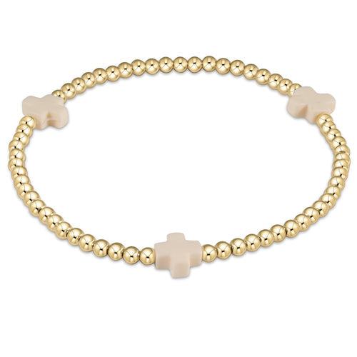 enewton Off White Signature Cross Gold Pattern 3mm Bead Bracelet, available at Be Charmed