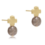 A pair of gold-filled cross-shaped stud earrings with labradorite stones. Available at Be Charmed