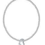 enewton sterling silver 2 mm bead bracelet featuring a small LOVE heart charm, stretch‑fit and stackable. Available at Be Charmed.