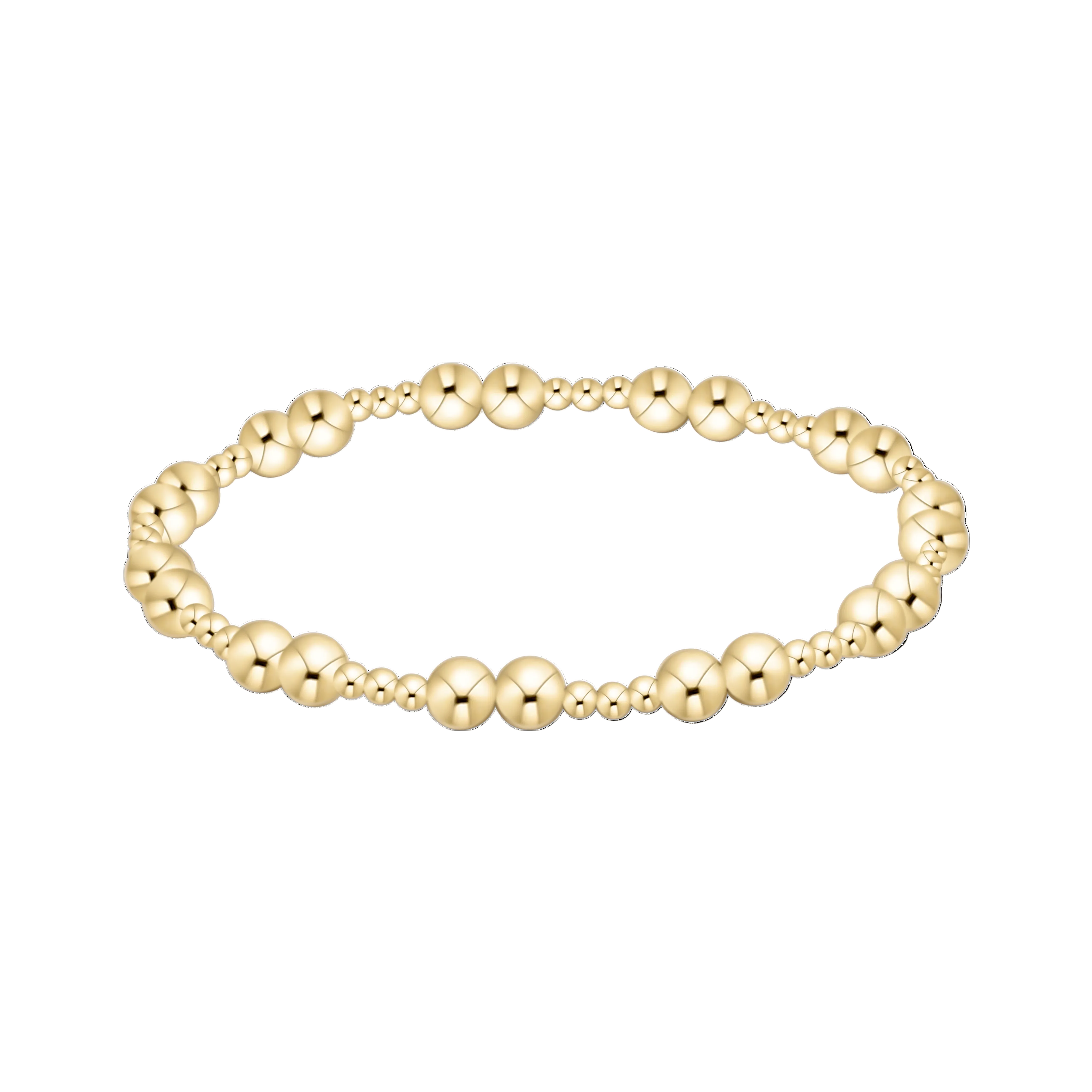 Gold beaded bracelet on a white background. Available at Be Charmed