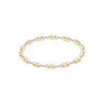 Gold and silver beaded bracelet on a white background. Available at Be Charmed