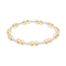 Gold and silver beaded bracelet on a white background. Available at Be Charmed