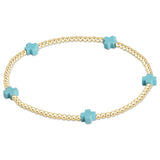 enewton Turquoise Signature Cross Small Gold 2mm Bead Bracelet, available at Be Charmed