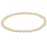 enewton Hope Grateful Bracelet – white 2mm seed beads alternating with 2mm 14kt gold-filled beads on stretch elastic. Worry-free wear—sleep, shower, sweat. Stackable elegance. Available at Be Charmed