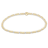 enewton Hope Sincerity 2mm bracelet with white beads in a symbolic pattern; minimalist, elegant, and stretch-fit. Available at Be Charmed.