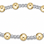 enewton extends bracelet with alternating gold and silver beads on a white background. Available at Be Charmed