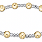 enewton extends bracelet with alternating gold and silver beads on a white background. Available at Be Charmed