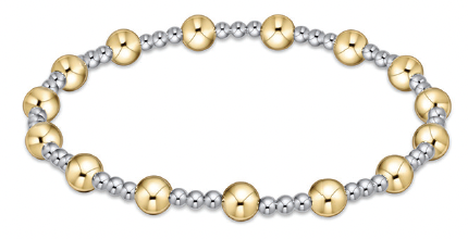 enewton extends bracelet with alternating gold and silver beads on a white background. Available at Be Charmed