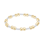 enewton extend together Gold and silver beaded bracelet on a white background. Available at Be Charmed