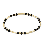 enewton Gemstone Gold Joy Pattern 3mm Bead Bracelet in Faceted Onyx—black gemstone stacking bracelet with gold accents. Available at Be Charmed