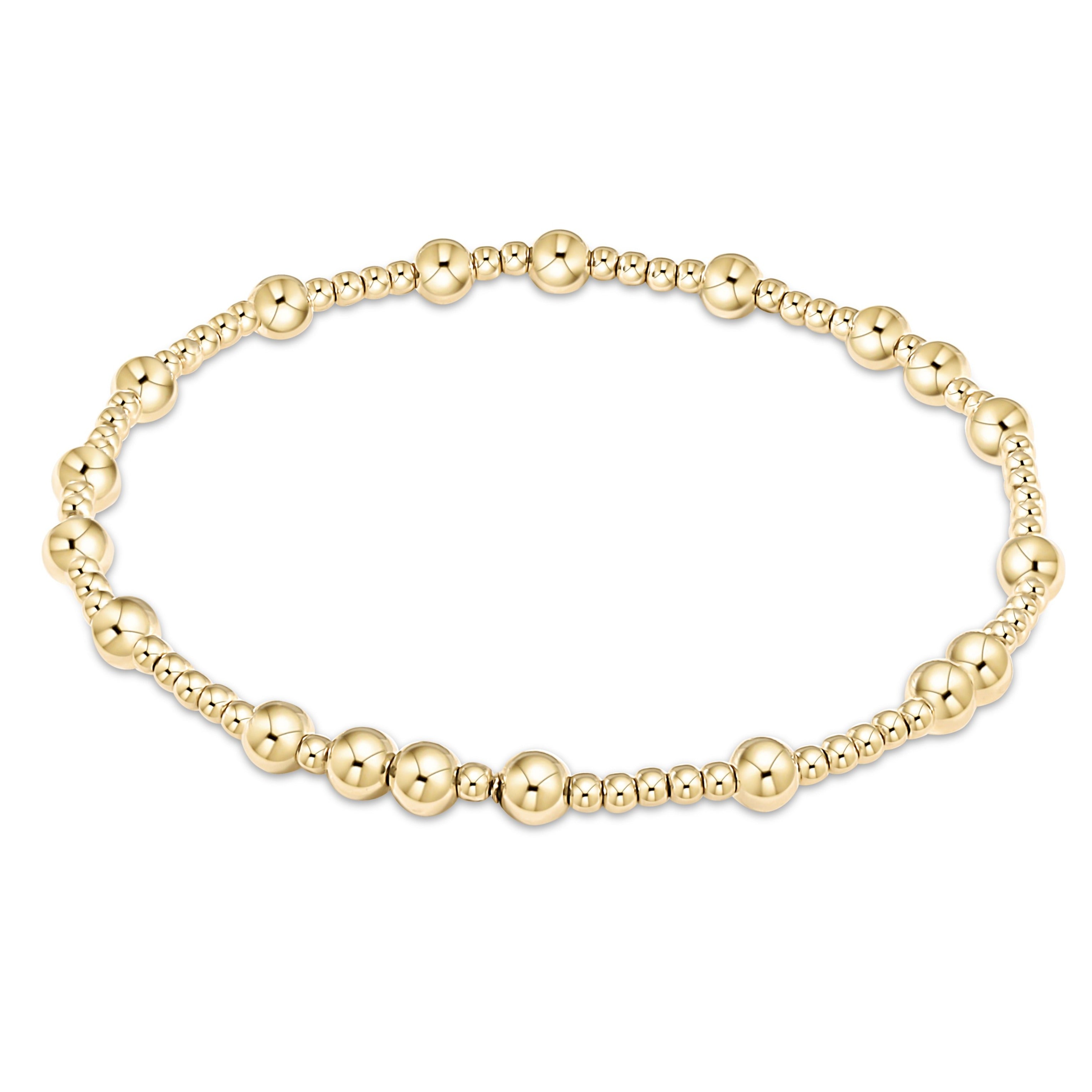 enewton Gold beaded bracelet on a white background. Available at Be Charmed