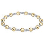 An enewton bracelet with a mix of silver and gold-filled beads, featuring a classic sincerity pattern. Available at Be Charmed