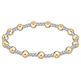 An enewton bracelet with a mix of silver and gold-filled beads, featuring a classic sincerity pattern. Available at Be Charmed