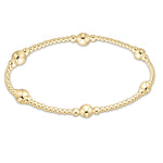 enewton Purpose Gold 5mm Bracelet featuring gleaming 14kt gold-filled beads on high-performance elastic, available at Be Charmed