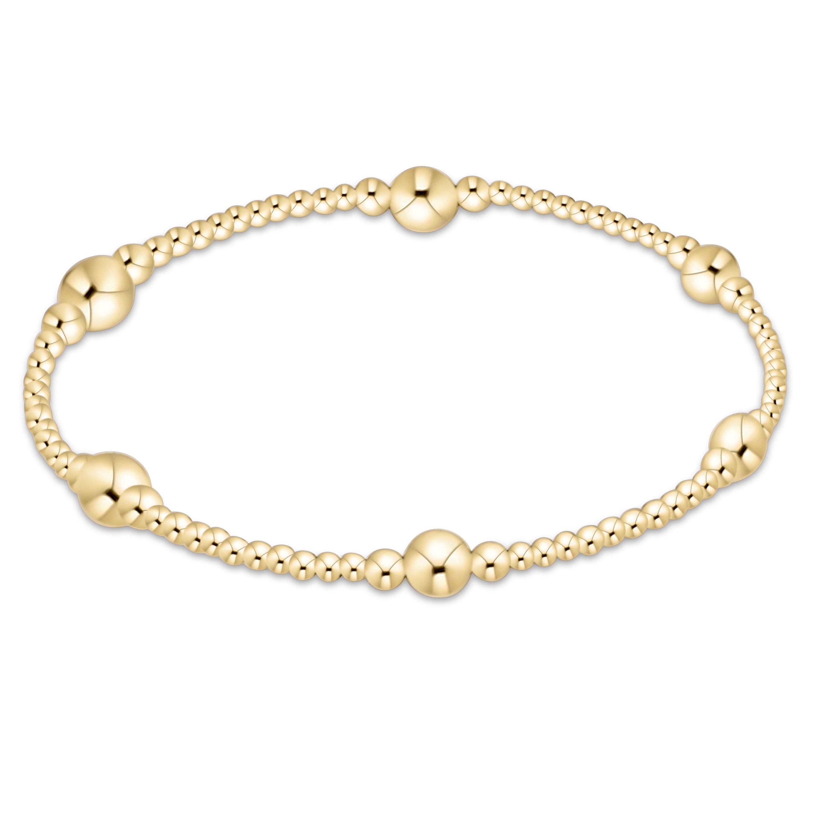 enewton Purpose Gold 5mm Bracelet featuring gleaming 14kt gold-filled beads on high-performance elastic, available at Be Charmed