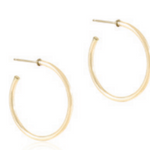 enewton Gold hoop earrings on a white background. Available at Be Charmed