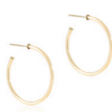 enewton Gold hoop earrings on a white background. Available at Be Charmed