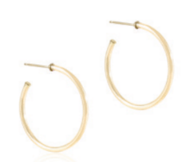 enewton Gold hoop earrings on a white background. Available at Be Charmed