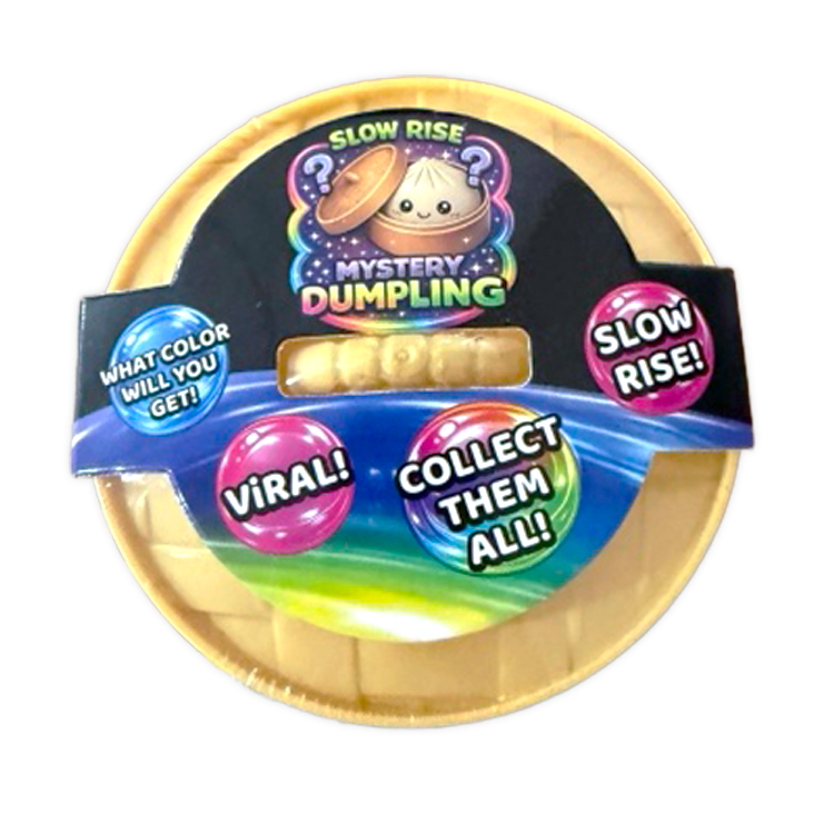 Mystery Dumpling packaging with colorful text and a gold lid on a white background. Available at Be Charmed