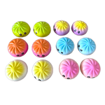 Variety of squish dumplings with faces on a white background. Available at Be Charmed