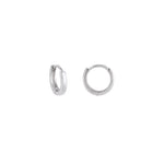 Silver fyb Petite Chloe Huggie Earrings crafted in 18k gold-plated sterling silver with sparkling CZ accents. Dainty hoops for stacking or solo wear. Available at Be Charmed.