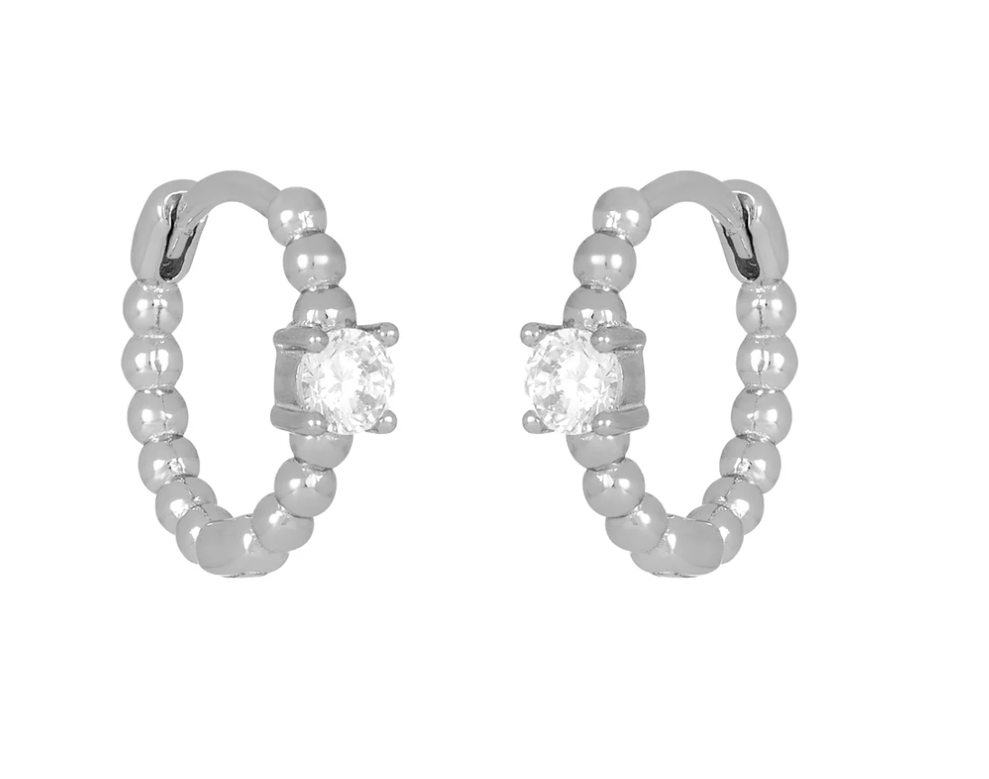 FYB Zia Huggie silver earrings with single cubic zirconia available at Be Charmed.