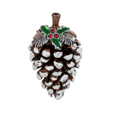 A small bronze-tone Ganz pinecone charm with white frosted snow tips and green holly detailing on top. Available at Be Charmed