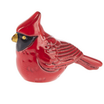 Ganz Charm A small red cardinal figurine with a glossy red finish, black eye patch, and gold beak, shown on a plain white background. Available at Be Charmed