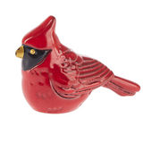 Ganz Charm A small red cardinal figurine with a glossy red finish, black eye patch, and gold beak, shown on a plain white background. Available at Be Charmed