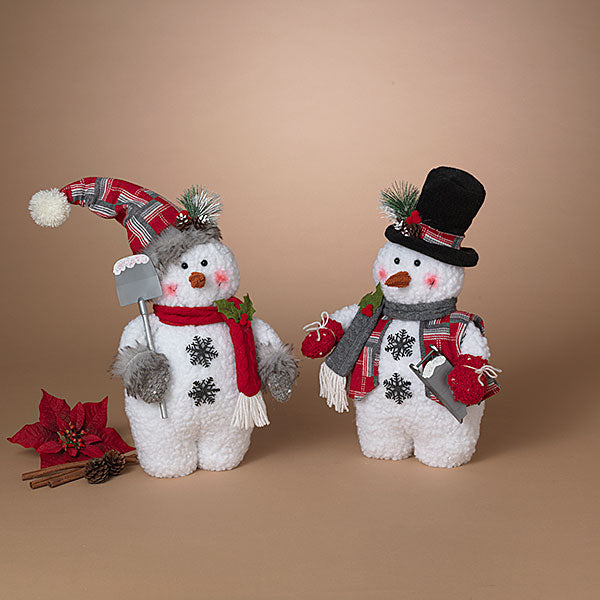 Two decorative snowmen with festive attire on a brown background. Available at Be Charmed